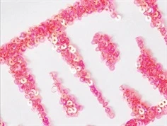 Name It bright white top Marvel pailletter